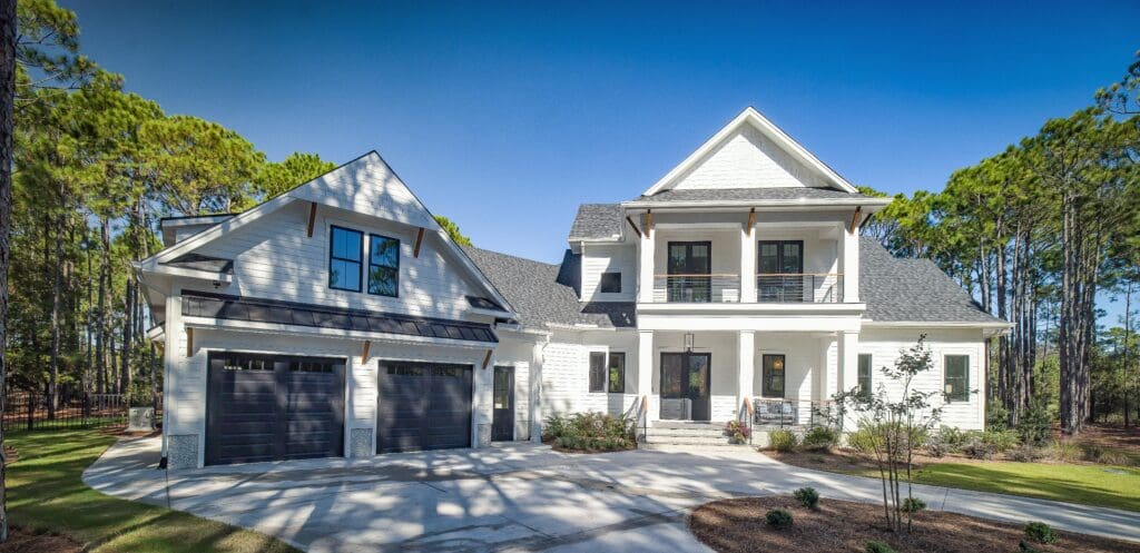 Modern two-story house with double garage.